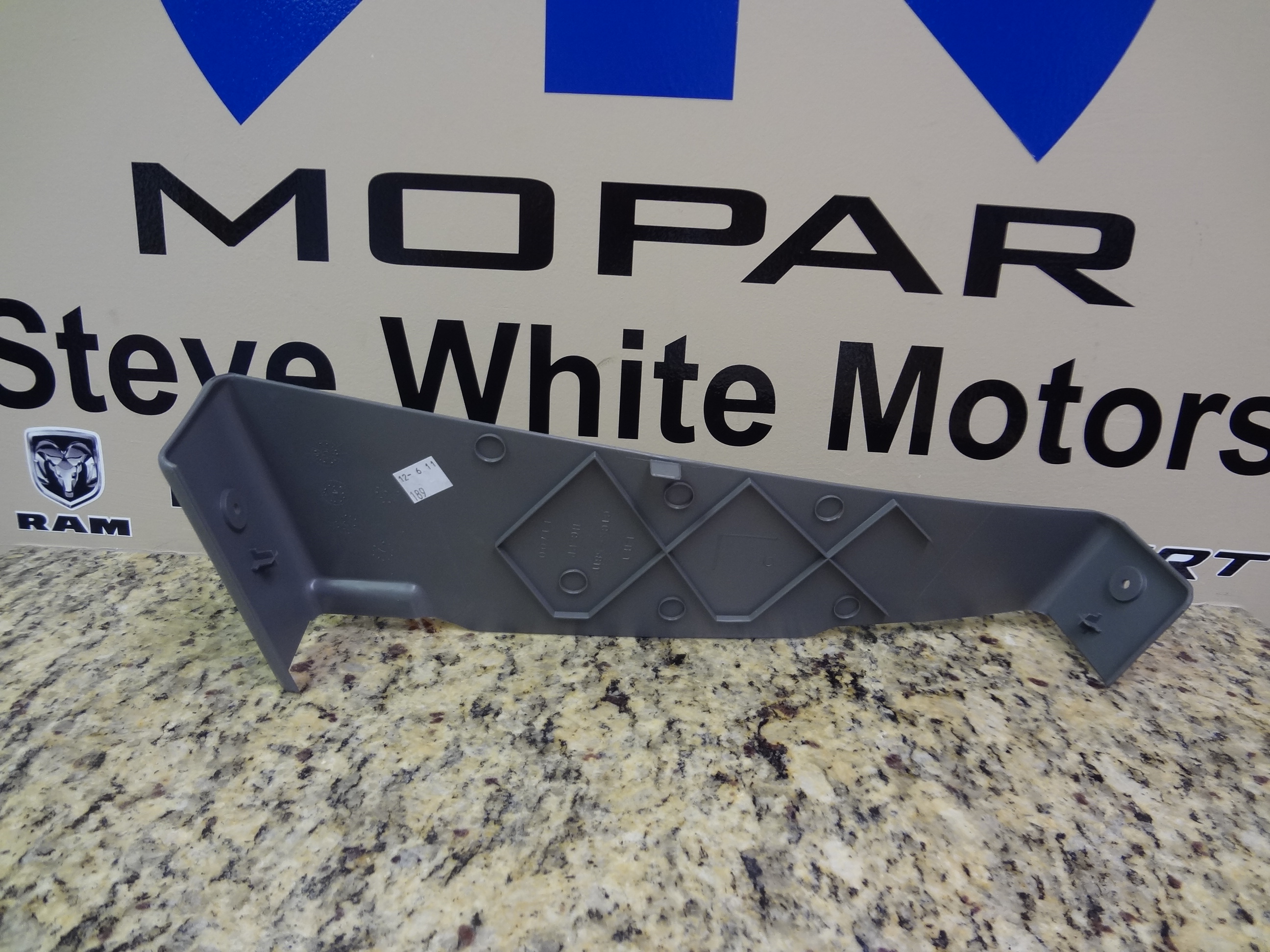 UD851D5AA - Interior Trim: Front Power Seat Adjuster Cover, Outboard for Mopar Image