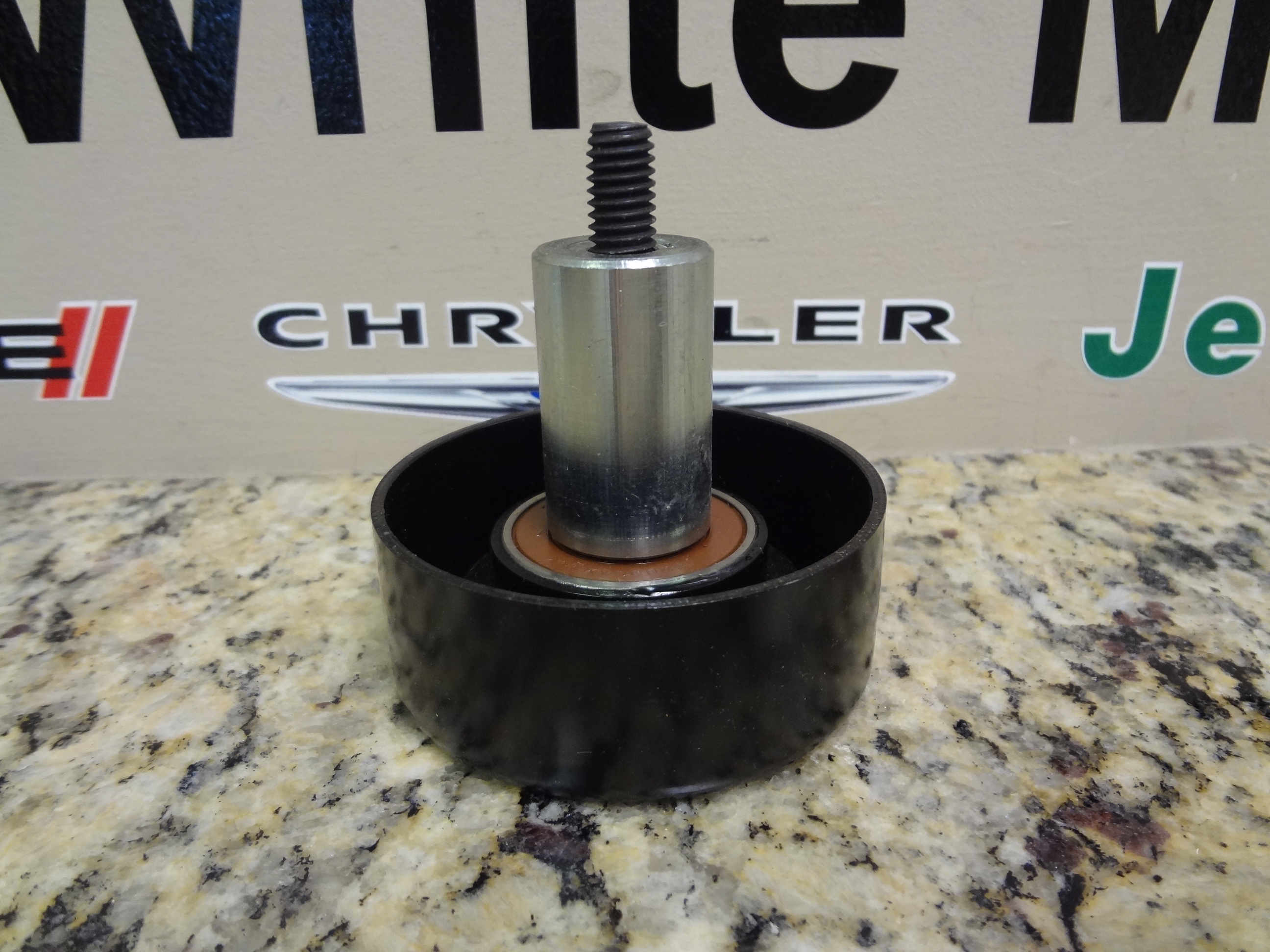 4854092AC - : Idler Pulley for Jeep: Grand Cherokee, Wrangler Image