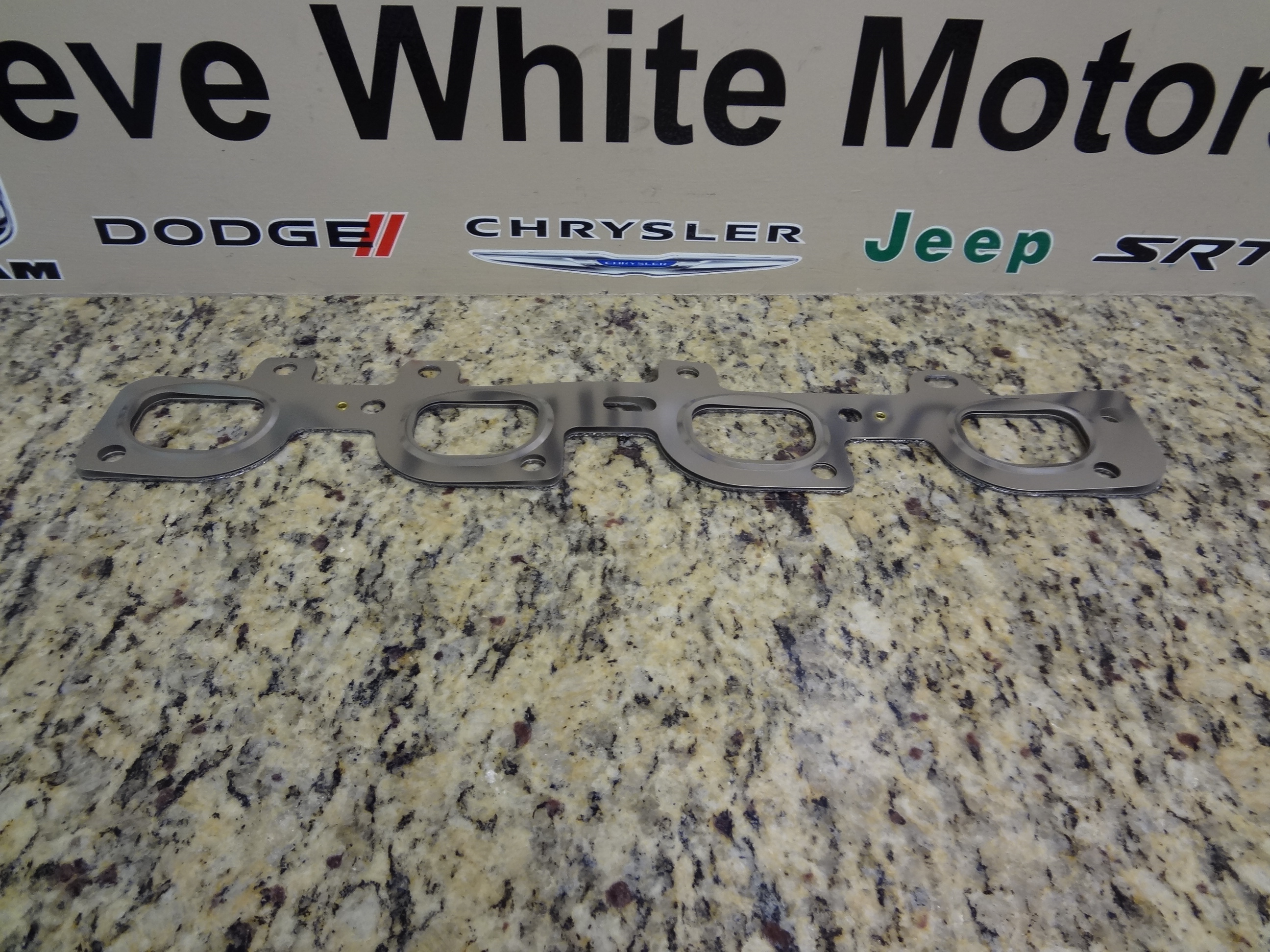 5038098AA - : Exhaust Manifold Gasket, Right Side for Chrysler: 300 | Dodge: Challenger, Charger, Durango, Magnum | Jeep: Grand Cherokee Image