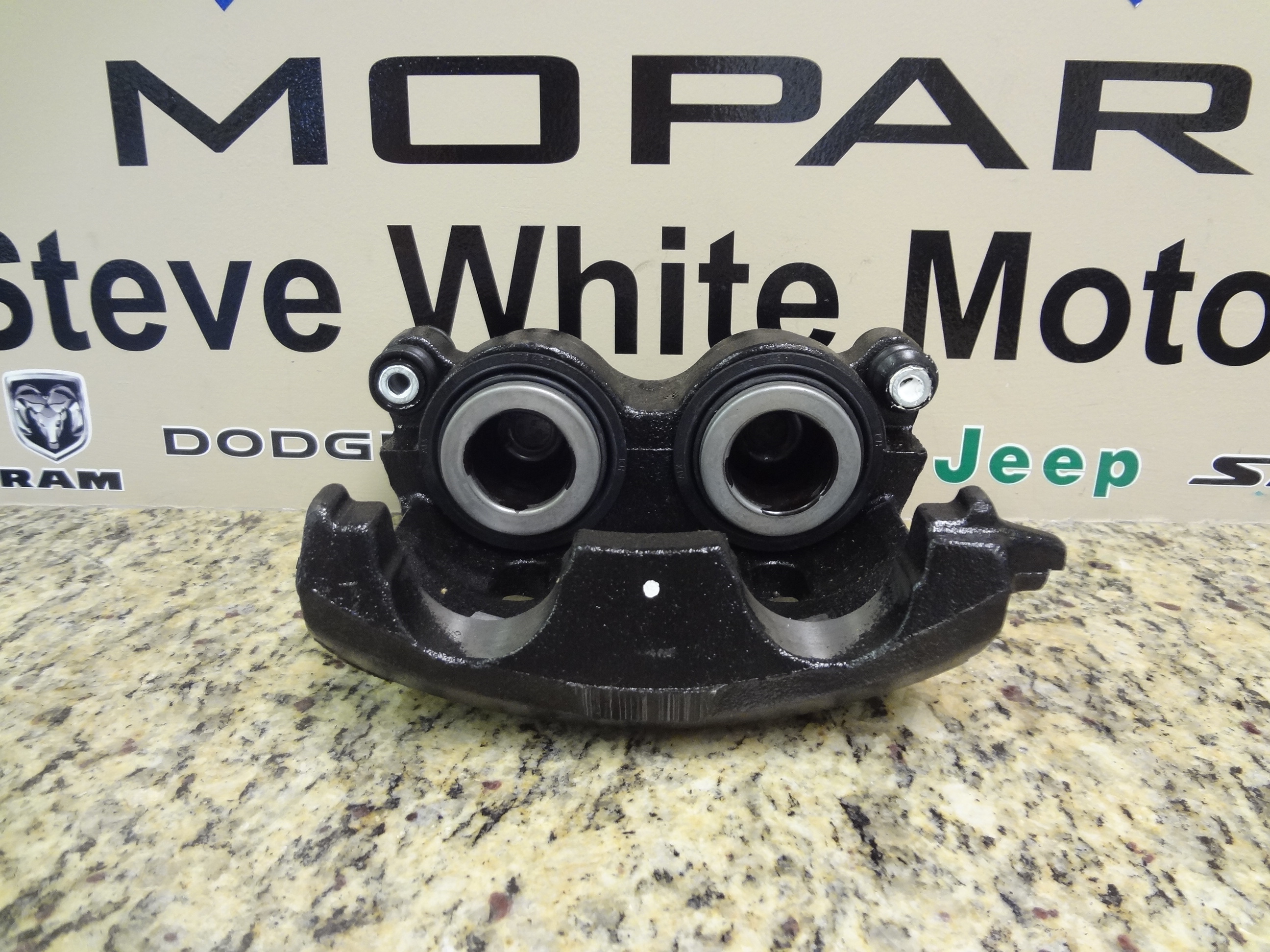 5093269AA - Service Brakes: Disc Brake Caliper, Left for Dodge: Ram 1500, Ram 2500, Ram 3500 Image