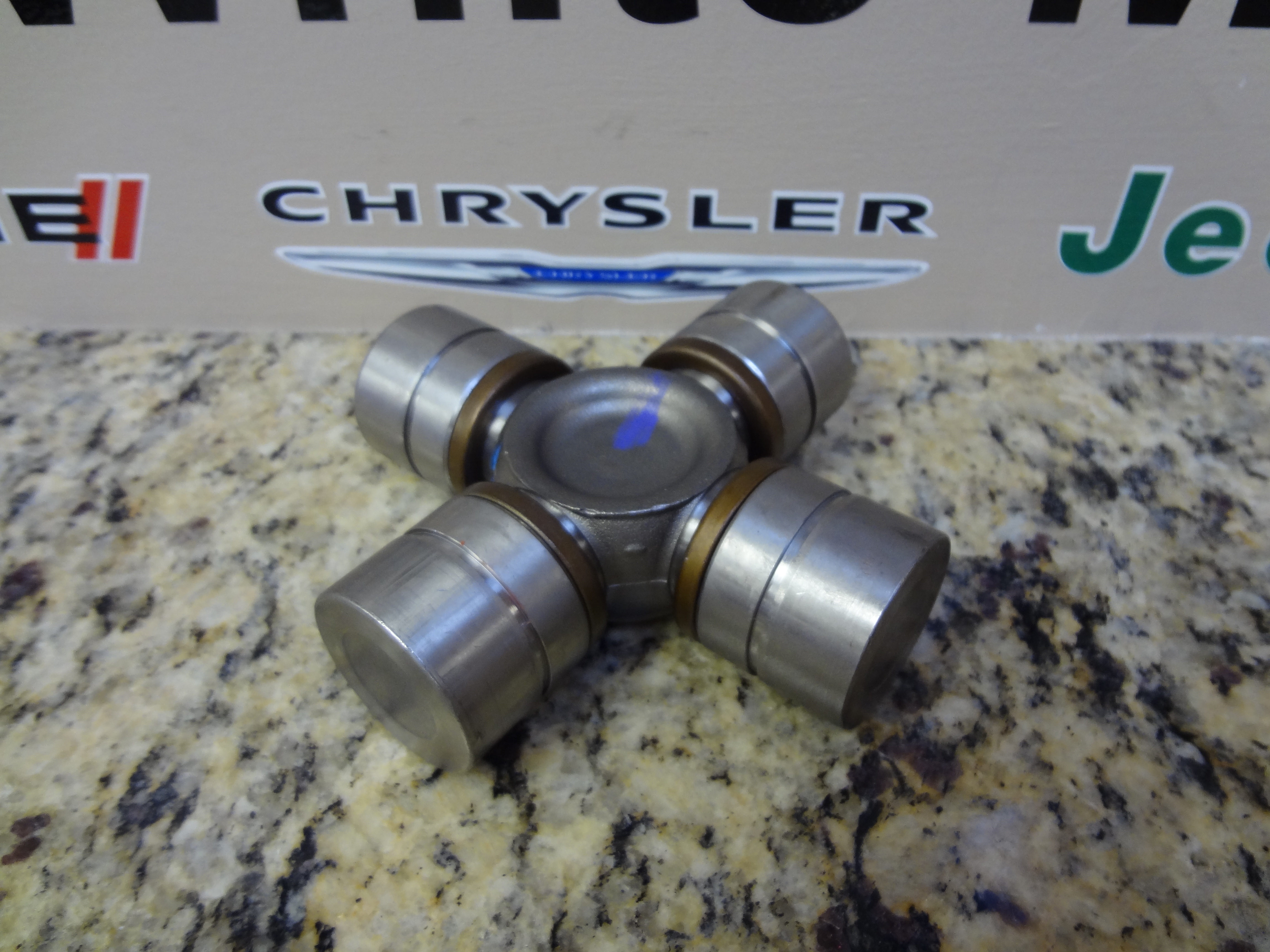 5102157AE - Rear Axle; American Axle 292 MM Single Rear Wheel; Differential and Drive Line: U-joint Kit for Dodge: Ram 2500, Ram 3500 | Ram: 1500, 2500, 3500 Image