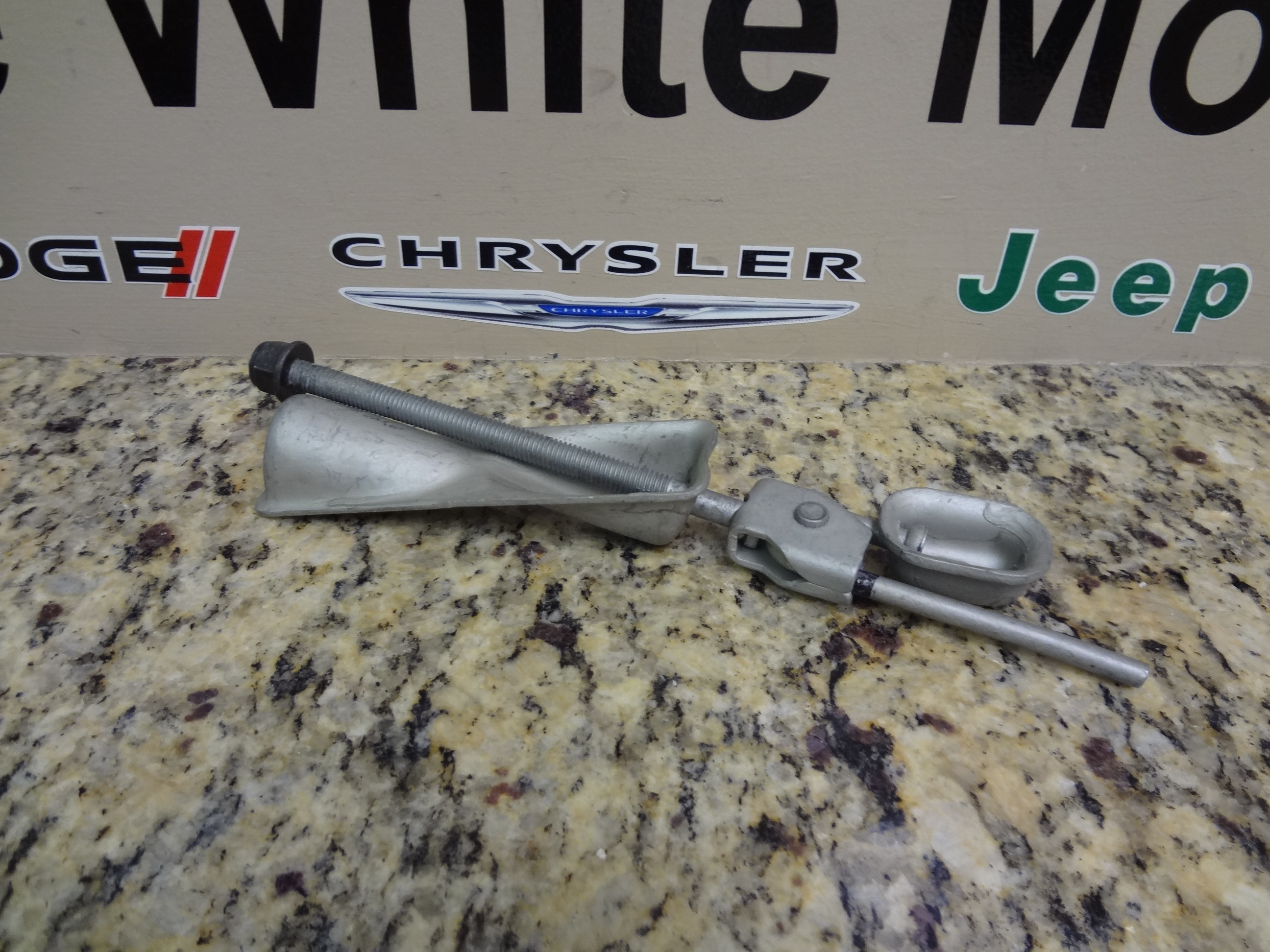 52008437AE - Parking Brake: Parking Brake Cable Tensioner for Dodge: Ram 1500, Ram 2500 Image