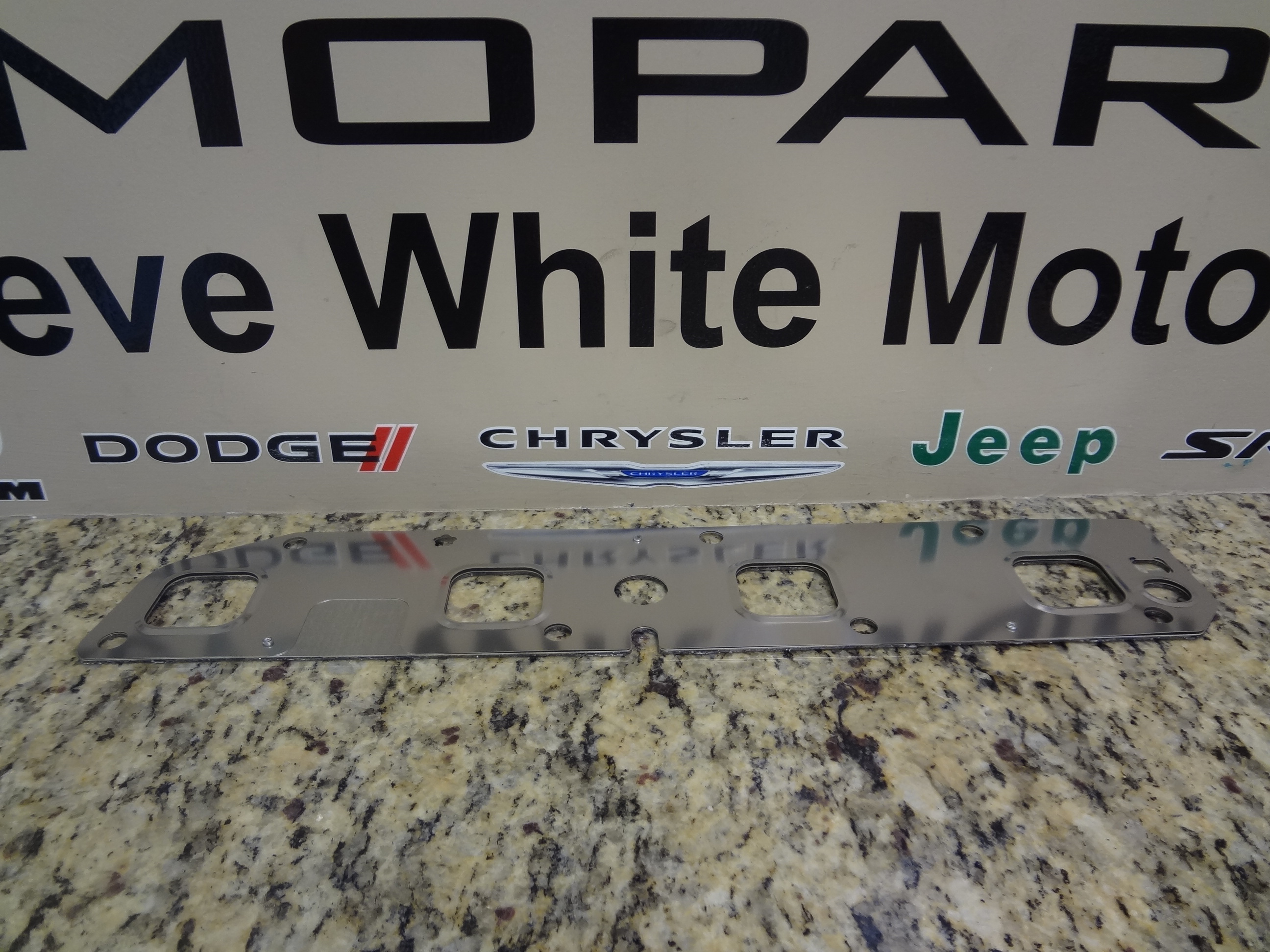 53013944AA - : Exhaust Manifold Gasket, Right for Chrysler: 300, Aspen | Dodge: Charger, Durango, Magnum, Ram 1500, Ram 2500, Ram 3500 | Jeep: Commander, Grand Cherokee Image