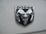 55277435AC - Exterior Ornamentation: Medallion Nameplate for Mopar Image