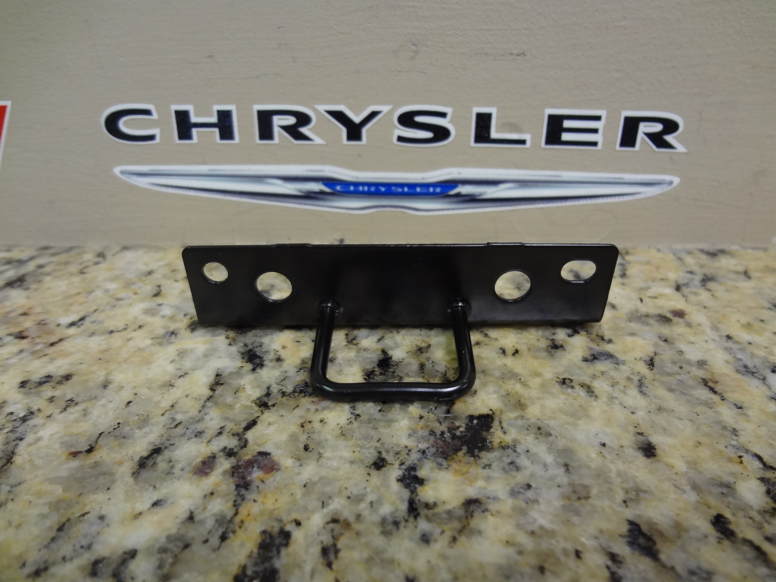 68050731AA - Interior Trim: Glove Box Door Latch Striker, Upper for Dodge: Ram 1500, Ram 2500 | Ram: 1500, 1500 Classic, 2500, 3500 Image