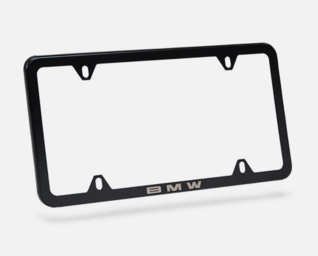 82120042710 - Exterior: License Plate Frame, Laser Slimline Black for BMW: 228i, 228i xDrive, 230i, 230i xDrive, 320i, 320i xDrive, 328d, 328d xDrive, 328i, 328i xDrive, 330e, 330i, 330i GT xDrive, 330i xDrive, 335i GT xDrive, 335i xDrive, 340i, 340i GT xDrive, 340i xDrive, 428i, 428i xDrive, 430i, 430i xDrive, 435i, 435i xDrive, 440i, 440i xDrive, 528i, 528i xDrive, 530i, 530i xDrive, 535d, 535d xDrive, 535i, 535i GT, 535i GT xDrive, 535i xDrive, 540d xDrive, 540i, 540i xDrive, 550i, 550i GT xDrive, 550i xDrive, 640i, 640i Gran Coupe, 640i xDrive, 640i xDrive Gran Coupe, 640i xDrive Gran Turismo, 650i, 650i Gran Coupe, 650i xDrive, 650i xDrive Gran Coupe, 740e xDrive, 740i, 740i xDrive, 740Li, 740Li xDrive, 750i, 750i xDrive, 750Li, 750Li xDrive, 760Li, 840i, Alpina B6 xDrive Gran Coupe, Alpina B7, M2, M235i, M235i xDrive, M240i, M240i xDrive, M3, M340i, M4, M5, M550i xDrive, M6, M6 Gran Coupe, M760i xDrive, M8, X1, X2, X3, X4, X5, X6, X7, Z4 Image