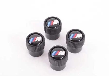 36122456427 - Wheels: Valve Stem Caps - Black - M Logo for BMW: 230i, 230i xDrive, 320i, 320i xDrive, 328d, 328d xDrive, 330e, 330i, 330i GT xDrive, 330i xDrive, 340i, 340i GT xDrive, 340i xDrive, 430i, 430i Gran Coupe, 430i xDrive, 440i, 440i xDrive, 530i, 530i xDrive, 540d xDrive, 540i, 540i xDrive, 640i, 640i Gran Coupe, 640i xDrive, 640i xDrive Gran Coupe, 640i xDrive Gran Turismo, 650i, 650i Gran Coupe, 650i xDrive, 650i xDrive Gran Coupe, 740i, 740i xDrive, 750i, 750i xDrive, 840i, 840i Gran Coupe, Alpina B6 xDrive Gran Coupe, Alpina B7, M2, M240i, M240i xDrive, M3, M340i, M4, M440i Gran Coupe, M5, M550i xDrive, M6, M6 Gran Coupe, M760i xDrive, M8, X1, X2, X3, X4, X5, X6, X7, Z4 Image