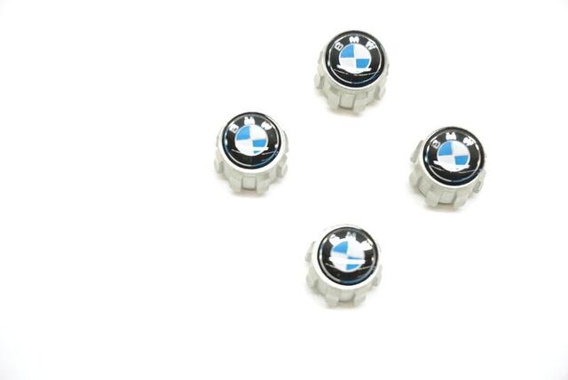 36122447401 - Wheels: Valve Stem Cap Set - Roundel Logo for BMW: 230i, 230i xDrive, 320i, 320i xDrive, 328d, 328d xDrive, 330e, 330i, 330i GT xDrive, 330i xDrive, 340i, 340i GT xDrive, 340i xDrive, 430i, 430i xDrive, 440i, 440i xDrive, 530i, 530i xDrive, 540d xDrive, 540i, 540i xDrive, 640i, 640i Gran Coupe, 640i xDrive, 640i xDrive Gran Coupe, 640i xDrive Gran Turismo, 650i, 650i Gran Coupe, 650i xDrive, 650i xDrive Gran Coupe, 740i, 740i xDrive, 750i, 750i xDrive, 840i, Alpina B6 xDrive Gran Coupe, Alpina B7, M2, M240i, M240i xDrive, M3, M340i, M4, M5, M550i xDrive, M6, M6 Gran Coupe, M760i xDrive, M8, X1, X2, X3, X4, X5, X6, X7, Z4 Image