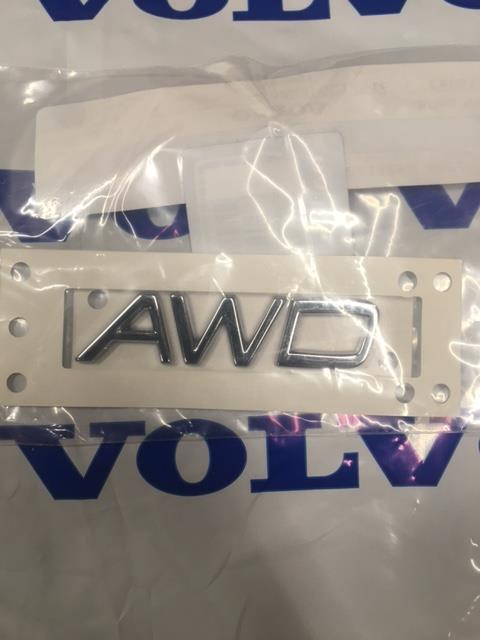 9157130 - Body: Nameplate for Volvo: S40, S60, S60 Cross Country, S70, S80, V50, V60, V60 Cross Country, V70, XC60, XC70, XC90 Image