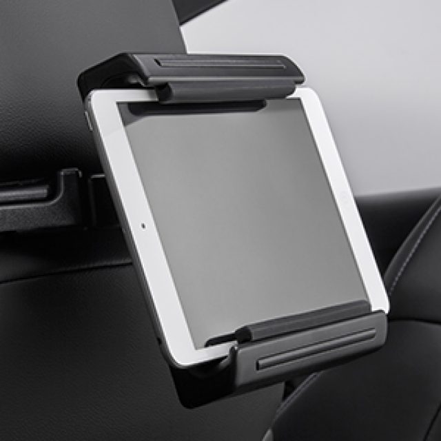 84141323 - Electronics: Universal Tablet Holder Backseat Passenger for Buick: Enclave, Encore, Envision, LaCrosse, Regal Sportback, Regal TourX | Cadillac: Escalade, Escalade ESV, XT5 | Chevrolet: Bolt EV, Colorado, Cruze, Cruze Limited, Equinox, Malibu, Malibu Limited, Suburban, Suburban 3500 HD, Tahoe, Trax, Volt | GMC: Acadia, Canyon, Sierra 1500, Sierra 2500 HD, Sierra 3500 HD, Terrain, Yukon, Yukon XL Image