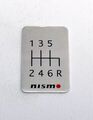 96935RN001 - : NISMO EMBLEM (SHIFT PATTERN 6-SPD) for Nismo Image