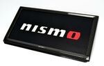96210RN010 - : NISMO CARBON LICENSE PLATE RIM for Nismo Image