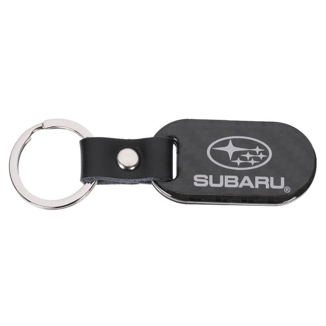 SOA342L155 - : Carbon Fiber Key Fob - Subaru Logo for Subaru: Ascent, BRZ, Crosstrek, Forester, Impreza, Legacy, Outback, Solterra, WRX Image