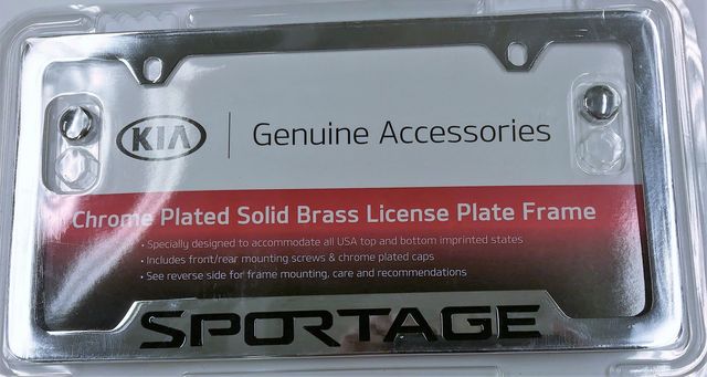 UR010AY100KM - Exterior: License Plate Frame - Chrome - Lower Logo for Kia: K5, Rio, Sportage Image