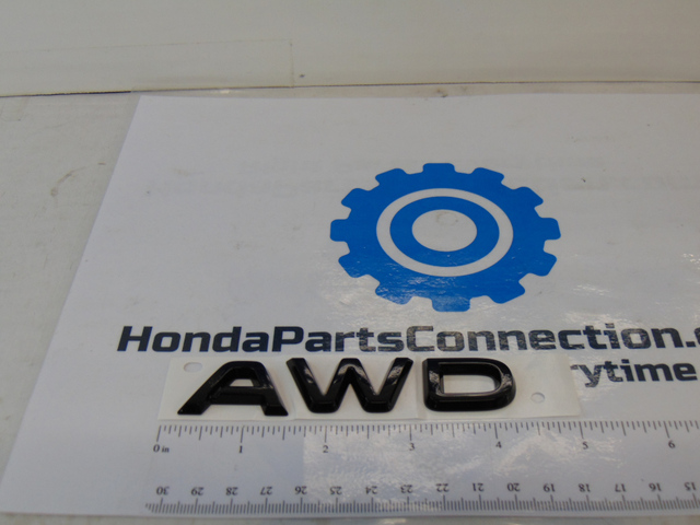 8F20T90100A - Exterior: 2023 Honda Pilot - Gloss Black Awd Emblem for Honda: Pilot Image