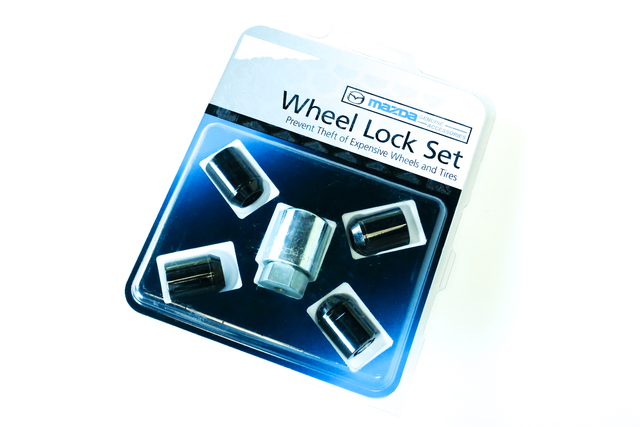 C9N2V9740A - Wheels: Alloy Wheels Locks - Black 2-Hex for Mazda: 3, 6, CX-3, CX-30, CX-5, CX-50, CX-9, CX-90, MX-5 Miata Image