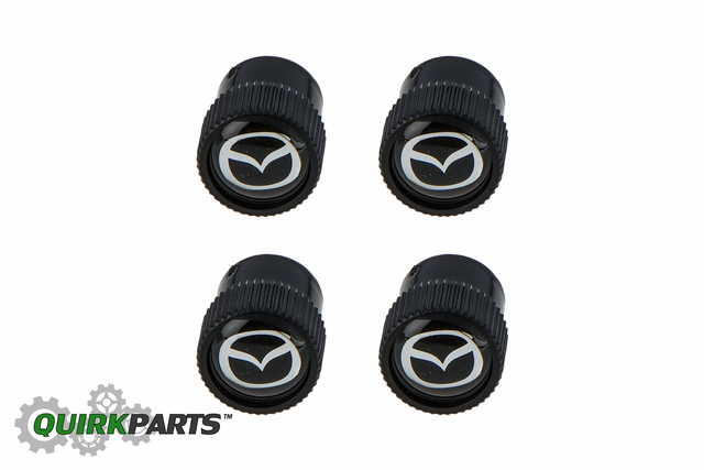 C9N2V3820 - Wheels: Valve Stem Caps, Black for Mazda: 2, 3, 5, 6, CX-3, CX-30, CX-5, CX-50, CX-7, CX-70, CX-9, CX-90, MPV, MX-30 EV, MX-5 Miata, RX-8, Tribute Image