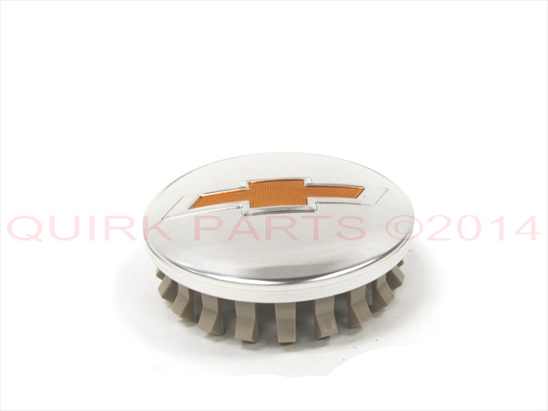 19301597 - Wheels: 15 Chevrolet Tahoe Suburban Center Cap Set Bowtie Logo Brilliant Silver OEM NEW for Chevrolet: Silverado 1500, Silverado 1500 LD, Silverado 1500 LTD, Silverado 2500 HD, Silverado 3500 HD, Suburban, Suburban 3500 HD, Tahoe Image