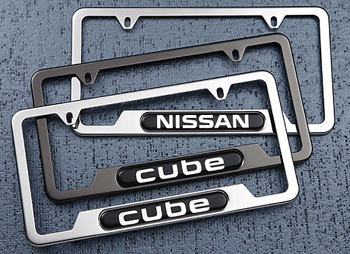 999MB7W000BP - Exterior: License Plate Frame, Black Pearl W/Cube Logo for Nissan Image