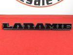 68483234AA - : Laramie Nameplate-Black for Ram: 1500 Image
