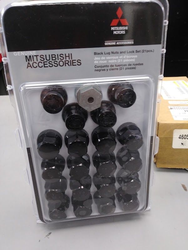 MZ315051 - Wheels: 2022 Outlander Wheel Lug Nuts And Lock Set, Black for Mitsubishi Image