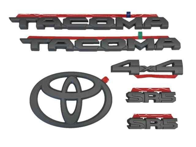 PT9483524411 - Exterior: Gunmetal Badge Emblem Overlays For SR5 | 2024 Tacoma for Toyota: Tacoma Image