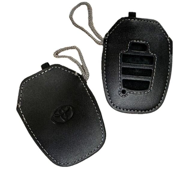 PT4203023050 - Interior: Key Gloves - Black - 4 Buttons | 2023-2026 Crown​ | 2024-2026 Land Cruiser Hybrid | 2023-2026 Prius for Toyota Image