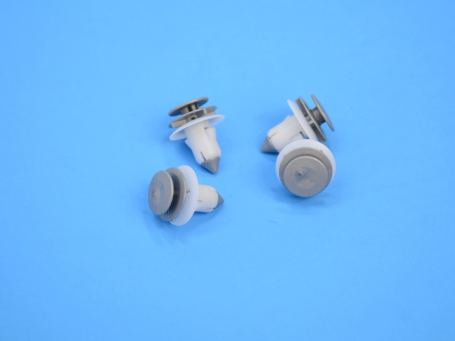 6505759AA - Interior Trim: Door Trim Panel Fastener for Chrysler: Pacifica, Town &amp; Country, Voyager | Dodge: Caravan, Grand Caravan | Ram: C/V Image