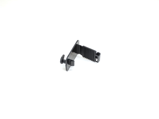 68079236AA - Interior Trim: Mat To Carpet Hook for Chrysler: 200, 300, Sebring, Town &amp; Country | Dodge: Avenger, Caliber, Challenger, Charger, Dakota, Durango, Grand Caravan, Journey, Nitro, Ram 1500, Ram 2500, Ram 3500 | Fiat: 500 | Jeep: Cherokee, Compass, Grand Cherokee, Liberty, Patriot, Wrangler | Ram: 1500, 1500 Classic, 2500, 3500, C/V | SRT: Viper Image