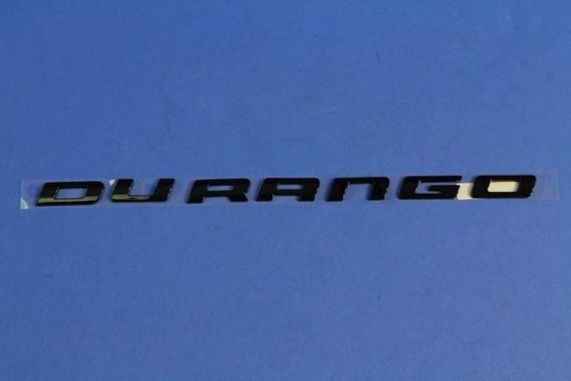 55112959AA - Exterior Ornamentation: Liftgate Nameplate, Left for Mopar Image