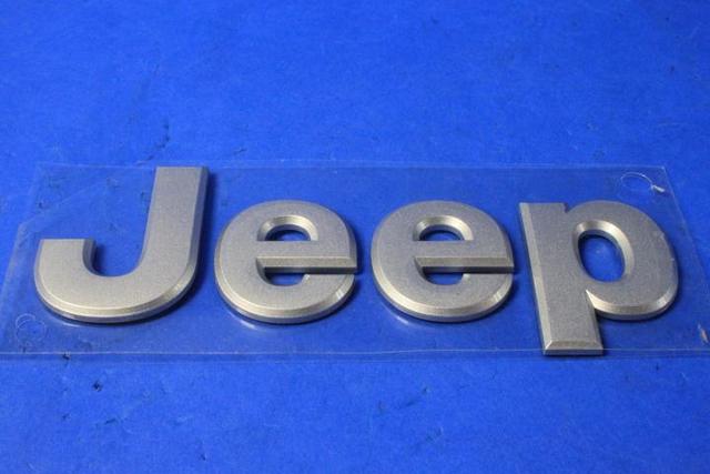 68238682AA - Exterior Ornamentation: Hood Nameplate for Jeep: Cherokee Image