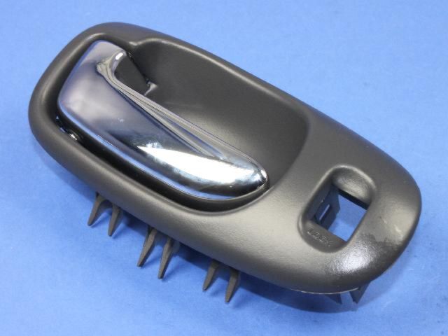 US271DVAA - Doors and Related Parts: Remote Handle Bezel, Left for Mopar Image