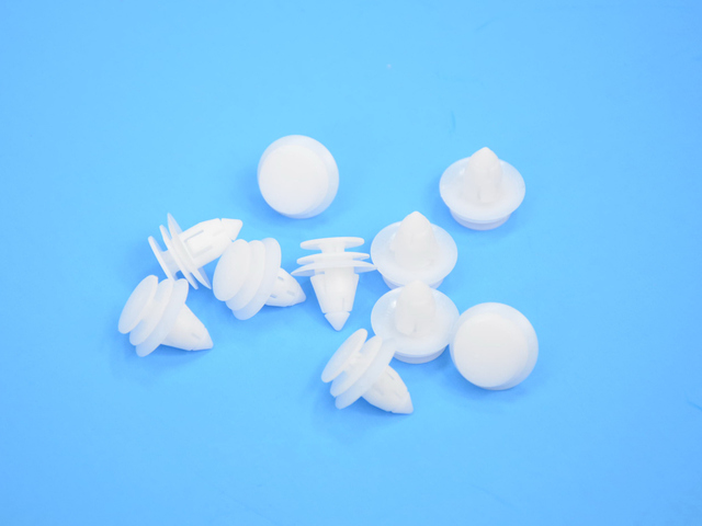 6505292AA - Interior Trim: Door Trim Panel Fastener for Chrysler: Pacifica, Town &amp; Country, Voyager | Dodge: Caravan, Grand Caravan | Ram: C/V Image