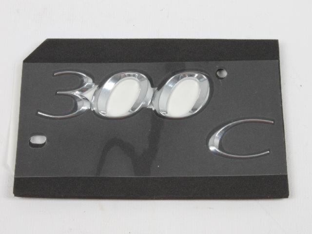 68087310AB - Exterior Ornamentation: Nameplate for Mopar Image