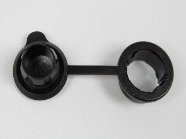 4685668AA - Instrument Panel and Radios and Consoles: Power Outlet Mount for Chrysler: 200, Pacifica, PT Cruiser, Sebring, Town &amp; Country, Voyager | Dodge: Avenger, Caravan, Grand Caravan, Nitro, Stratus | Jeep: Commander, Grand Cherokee, Liberty, Wrangler Image