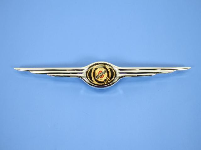 5011615AA - Frames and Bumpers: Winged Medallion Plinth for Chrysler: 300, Concorde, Town &amp; Country Image