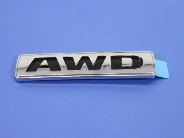 4806213AA - Exterior Ornamentation: All Wheel Drive Nameplate for Chrysler: 300 | Dodge: Avenger, Caliber, Charger, Journey, Magnum Image