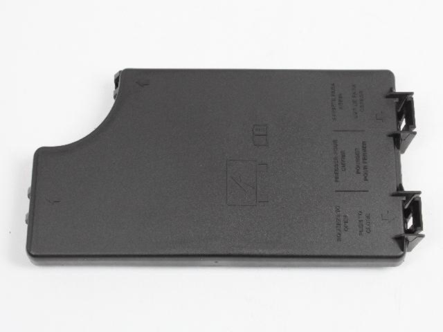 68004360AA - Electrical: Totally Integrated Power Module Cover for Chrysler: 200, PT Cruiser, Sebring | Dodge: Avenger, Caliber | Jeep: Compass, Patriot Image