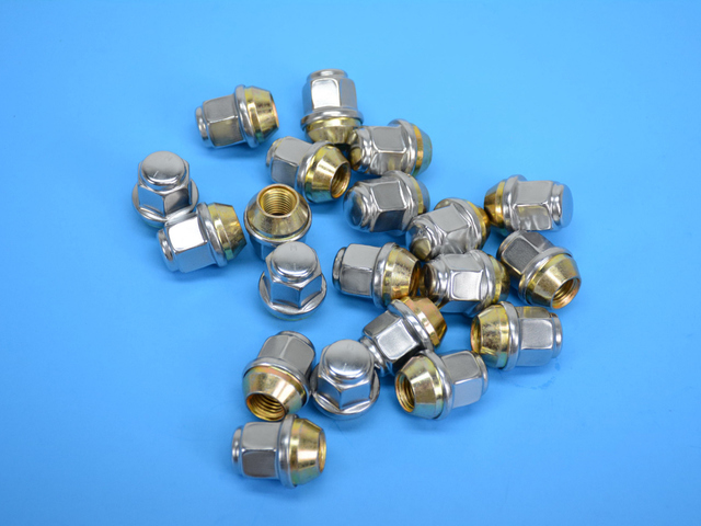 6509769AA - Wheels: Wheel Nut, Mounting for Chrysler: 200, 300M, Concorde, Pacifica, PT Cruiser, Sebring, Town &amp; Country, Voyager | Dodge: Avenger, Caliber, Caravan, Grand Caravan, Intrepid, Journey, Neon, Stratus | Jeep: Compass, Patriot | Ram: C/V Image