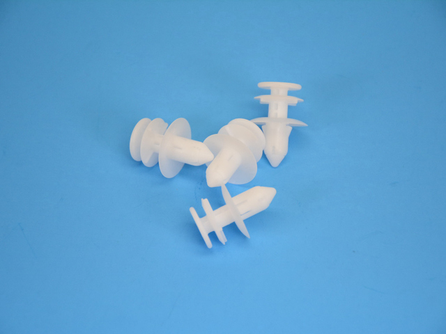 5023173AA - Interior Trim: Trim Panel Retainer for Chrysler: PT Cruiser | Dodge: Neon | Jeep: Liberty Image