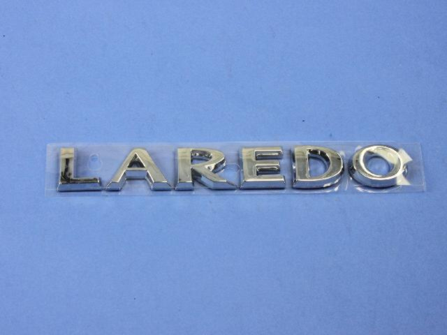 55157303AF - Exterior Ornamentation: Liftgate Nameplate for Jeep: Grand Cherokee, Grand Cherokee WK Image