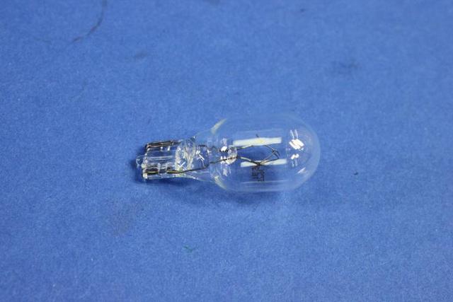 L0000579 - Electrical: Bulb for Chrysler: 300, PT Cruiser, Sebring, Town &amp; Country, Voyager | Dodge: Caravan, Dakota, Grand Caravan, Neon, Ram 1500, Ram 2500, Ram 3500, Stratus | Jeep: Commander, Grand Cherokee, Liberty Image