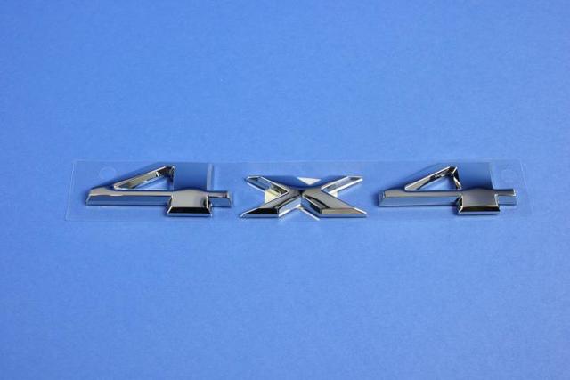 68240750AB - Exterior Ornamentation: Liftgate Nameplate for Jeep: Grand Cherokee, Grand Cherokee WK Image