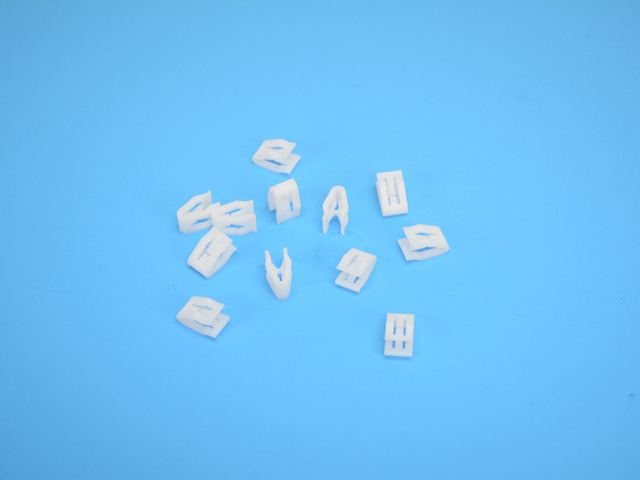 6510313AA - Interior Trim: Clip for Chrysler: 200, Pacifica, Voyager | Dodge: Challenger, Dart, Hornet | Fiat: 500E, 500L, 500X | Jeep: Cherokee, Compass, Grand Cherokee, Grand Cherokee L, Renegade, Wagoneer S | Ram: 1500, 2500, 3500 Image