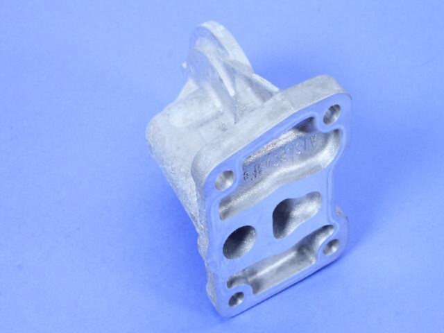 5047079AA - 2.4L Gas; Engine: Oil Filter Adapter for Chrysler: 200, Sebring | Dodge: Avenger, Caliber, Journey | Jeep: Compass, Patriot Image