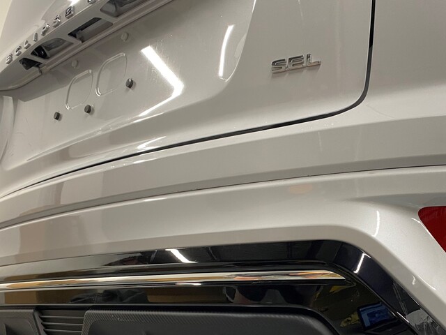 MZ315184 - Exterior: Badge, "Sel" for Mitsubishi: Eclipse Cross, Outlander, Outlander PHEV Image