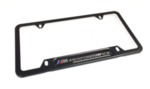 82125A1C494 - Exterior: License Plate Frame, Powered by M for BMW: 228i, 230i, 320i, 328d, 328i, 330e, 330i, 330i GT xDrive, 335i, 340i, 340i GT xDrive, 428i, 430i, 430i Gran Coupe, 435i, 440i, 528i, 530i, 535d, 535i, 540i, 550i, 640i, 640i Gran Coupe, 640i xDrive Gran Turismo, 650i, 650i Gran Coupe, 740i, 740Li, 750i, 750Li, 760Li, 840i, 840i Gran Coupe, Alpina B6 xDrive Gran Coupe, Alpina B7, M2, M235i, M240i, M3, M340i, M4, M440i Gran Coupe, M5, M550i xDrive, M6, M6 Gran Coupe, M760i xDrive, M8, X1, X2, X3, X4, X5, X6, X7, Z4 Image