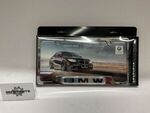82120010395 - Exterior: License Plate Frame, Stainless Steel for BMW: 128i, 135i, 135is, 228i, 228i xDrive, 230i, 230i xDrive, 320i, 320i xDrive, 328d, 328d xDrive, 328i, 328i xDrive, 330e, 330i, 330i GT xDrive, 330i xDrive, 335d, 335i, 335i GT xDrive, 335i xDrive, 335is, 340i, 340i GT xDrive, 340i xDrive, 428i, 428i xDrive, 430i, 430i Gran Coupe, 430i xDrive, 435i, 435i xDrive, 440i, 440i xDrive, 528i, 528i xDrive, 530i, 530i xDrive, 535d, 535d xDrive, 535i, 535i GT, 535i GT xDrive, 535i xDrive, 540d xDrive, 540i, 540i xDrive, 550i, 550i GT xDrive, 550i xDrive, 640i, 640i Gran Coupe, 640i xDrive, 640i xDrive Gran Coupe, 640i xDrive Gran Turismo, 650i, 650i Gran Coupe, 650i xDrive, 650i xDrive Gran Coupe, 740e xDrive, 740i, 740i xDrive, 740Li, 740Li xDrive, 750i, 750i xDrive, 750Li, 750Li xDrive, 760Li, 840i, 840i Gran Coupe, Alpina B6 xDrive Gran Coupe, Alpina B7, M2, M235i, M235i xDrive, M240i, M240i xDrive, M3, M340i, M4, M440i Gran Coupe, M5, M550i xDrive, M6, M6 Gran Coupe, M760i xDrive, M8, X1, X2, X3, X4, X5, X6, X7, Z4 Image
