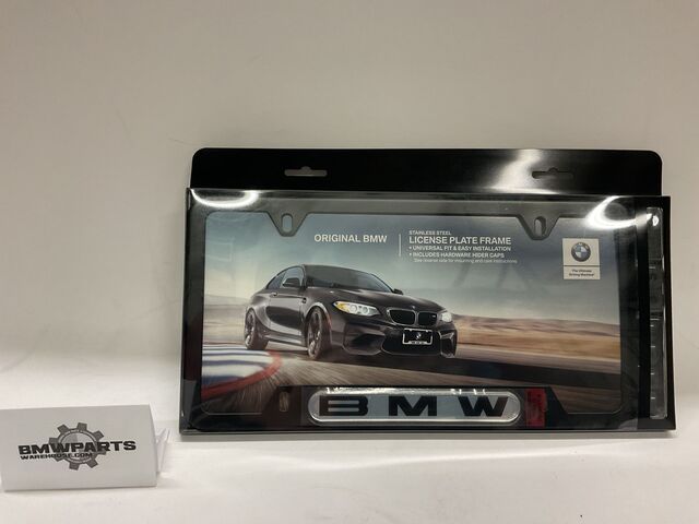 82120010398 - Exterior: License Plate Frame - Black Stainless Steel for BMW: 128i, 135i, 135is, 228i, 228i xDrive, 230i, 230i xDrive, 320i, 320i xDrive, 328d, 328d xDrive, 328i, 328i xDrive, 330e, 330i, 330i GT xDrive, 330i xDrive, 335d, 335i, 335i GT xDrive, 335i xDrive, 335is, 340i, 340i GT xDrive, 340i xDrive, 428i, 428i xDrive, 430i, 430i Gran Coupe, 430i xDrive, 435i, 435i xDrive, 440i, 440i xDrive, 528i, 528i xDrive, 530i, 530i xDrive, 535d, 535d xDrive, 535i, 535i GT, 535i GT xDrive, 535i xDrive, 540d xDrive, 540i, 540i xDrive, 550i, 550i GT xDrive, 550i xDrive, 640i, 640i Gran Coupe, 640i xDrive, 640i xDrive Gran Coupe, 640i xDrive Gran Turismo, 650i, 650i Gran Coupe, 650i xDrive, 650i xDrive Gran Coupe, 740e xDrive, 740i, 740i xDrive, 740Li, 740Li xDrive, 750i, 750i xDrive, 750Li, 750Li xDrive, 760Li, 840i, 840i Gran Coupe, Alpina B6 xDrive Gran Coupe, Alpina B7, M2, M235i, M235i xDrive, M240i, M240i xDrive, M3, M340i, M4, M440i Gran Coupe, M5, M550i xDrive, M6, M6 Gran Coupe, M760i xDrive, M8, X1, X2, X3, X4, X5, X6, X7, Z4 Image