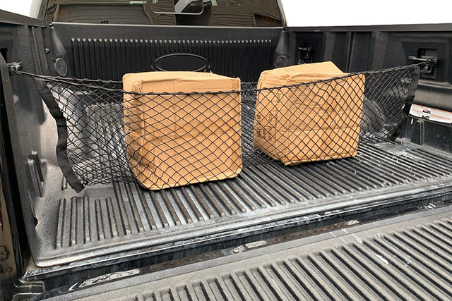 FL3Z99550A66A - : Bed Net - Vertical Mount for Ford: E-350 Super Duty, E-450 Super Duty, F-150, F-250 Super Duty, F-350 Super Duty, F-450 Super Duty, F-550 Super Duty Image